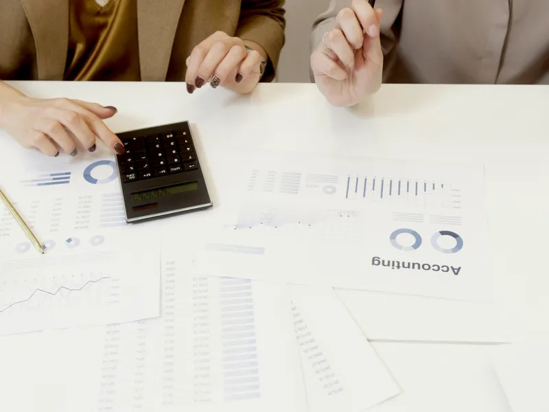 Financial statements and charts on a desk